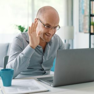 Businessman working from home and video conferencing