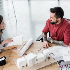 high angle view of virtual reality architect talking with colleague