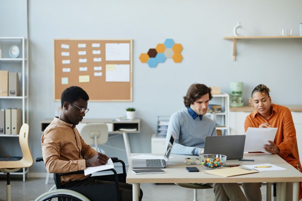 Person With Disability in Business Meeting