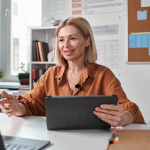 Teacher using laptop to teach online